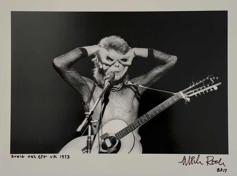 David Bowie performing Owl Eye in the UK, 1973, hand-titled and signed by Mick Rock.
