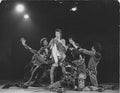 David Bowie performing on stage in London, photographed by Mick Rock. Unique vintage gelatin silver print.