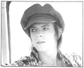 David Bowie on the train to Amsterdam, 1973, photographed by Mick Rock. Unique vintage gelatin silver print.