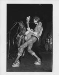 David Bowie on the 1972 UK Ziggy Stardust tour, photographed by Mick Rock. Unique vintage gelatin silver print.