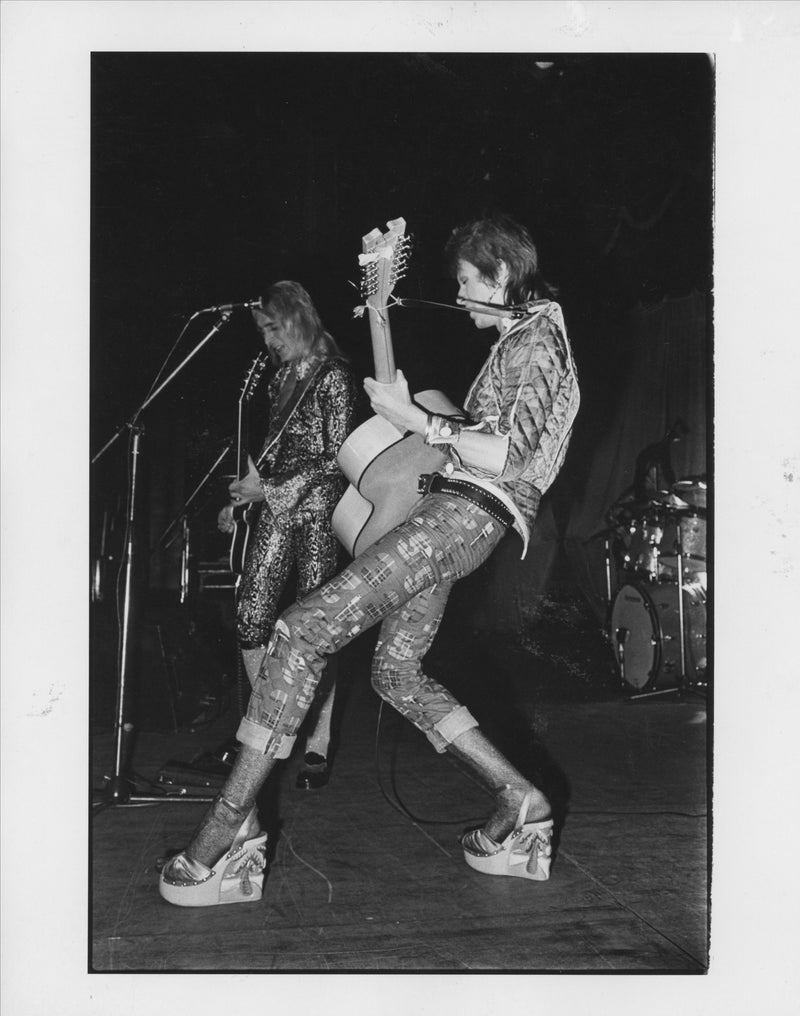 David Bowie on the 1972 UK Ziggy Stardust tour, photographed by Mick Rock. Unique vintage gelatin silver print.