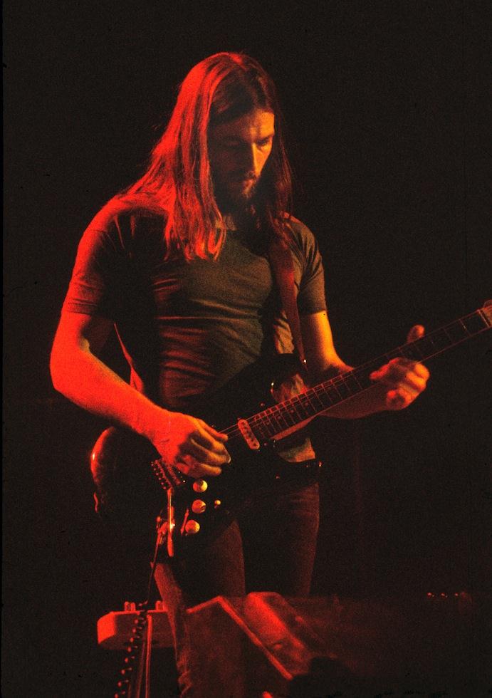 Colour photograph of David Gilmour of Pink Floyd performing in 1974, by Barrie Wentzell.