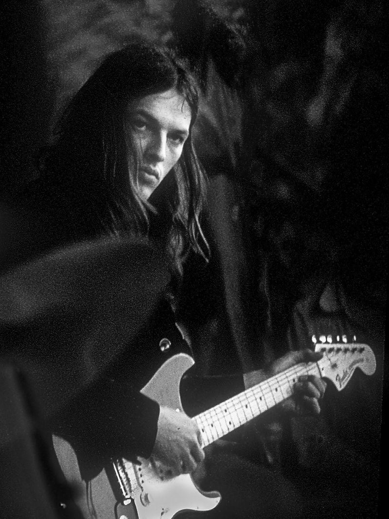 David Gilmour performing with an electric guitar in 1972. Photograph by Gijsbert Hanekroot.