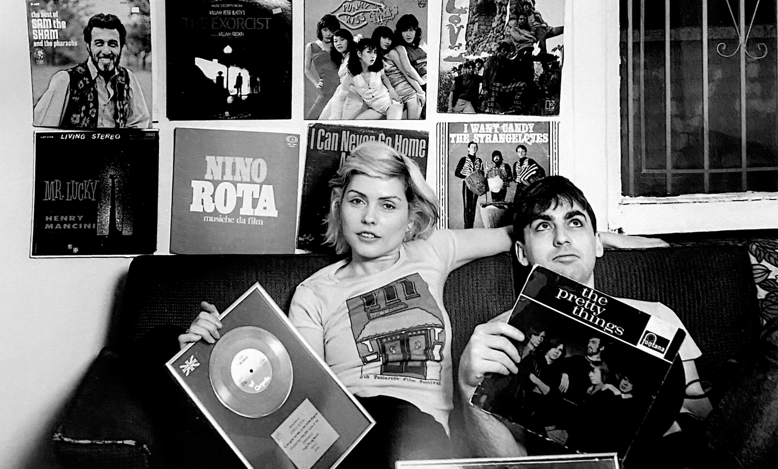 Debbie Harry and Chris Stein holding records in their New York City apartment, 1977.