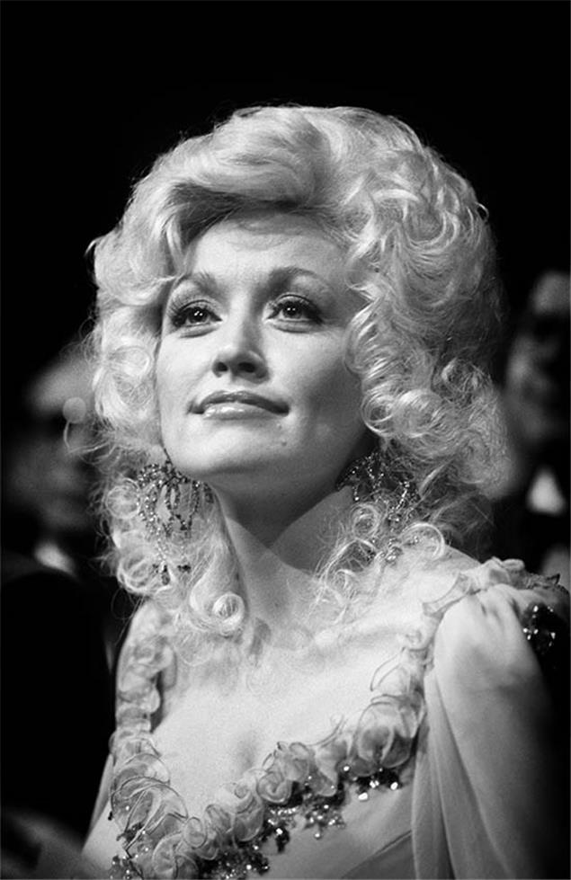 Close portrait of Dolly Parton photographed by Charlyn Zlotnik.