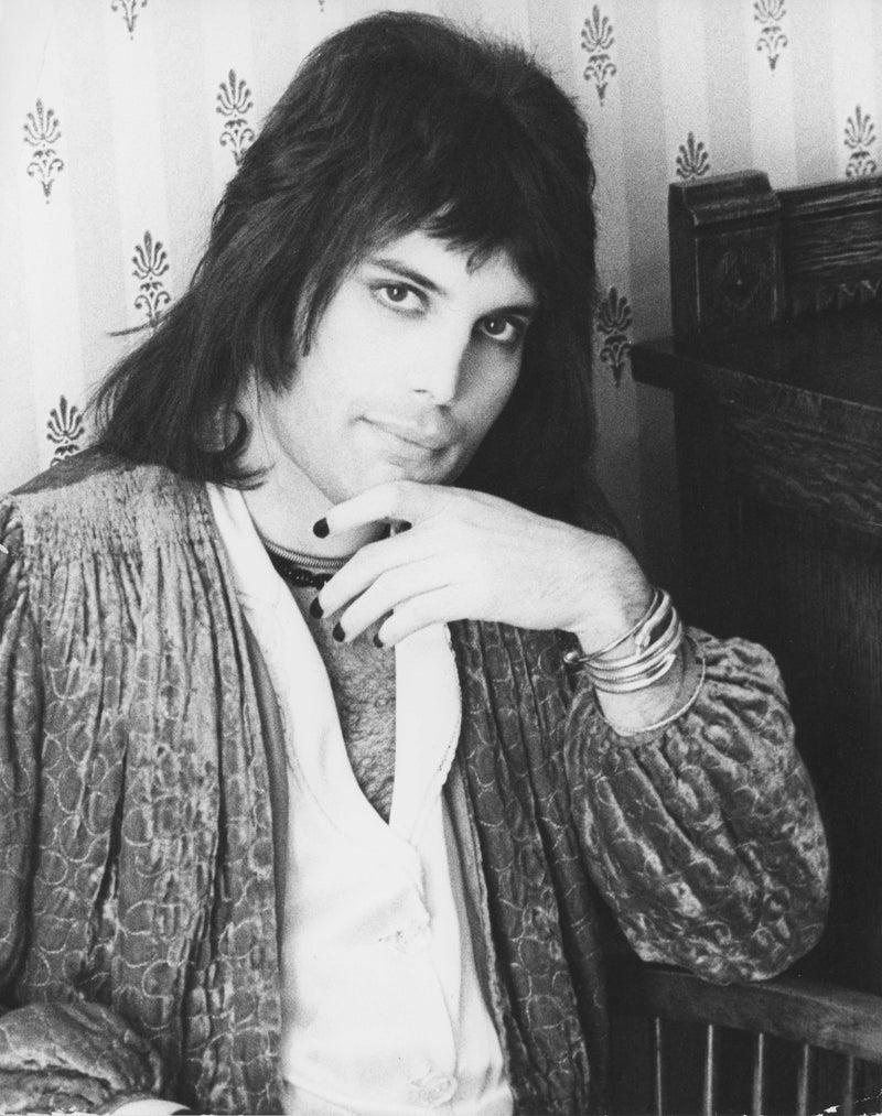 Freddie Mercury with hand raised to his face, 1975, photographed by Mick Rock. Unique vintage gelatin silver print.