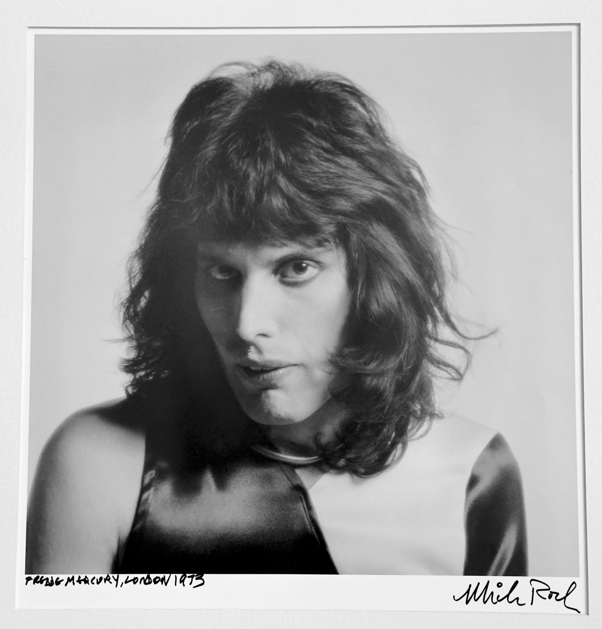 Freddie Mercury of Queen, luminous studio portrait, London 1973 — photograph by Mick Rock, a signed, hand-titled late print.