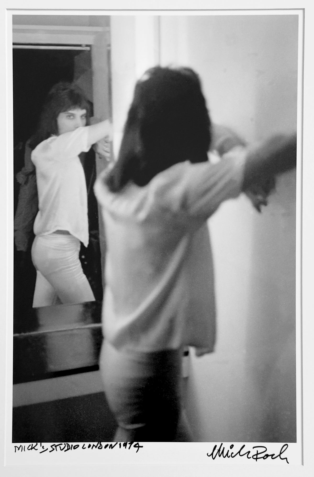 Freddie Mercury at the mirror in Mick Rock's studio, London 1974, during a solo session — photograph by Mick Rock, a signed, hand-titled late print.