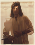 Freddie Mercury holding a goblet, London, 1974, photographed by Mick Rock. Unique vintage chromogenic colour print.