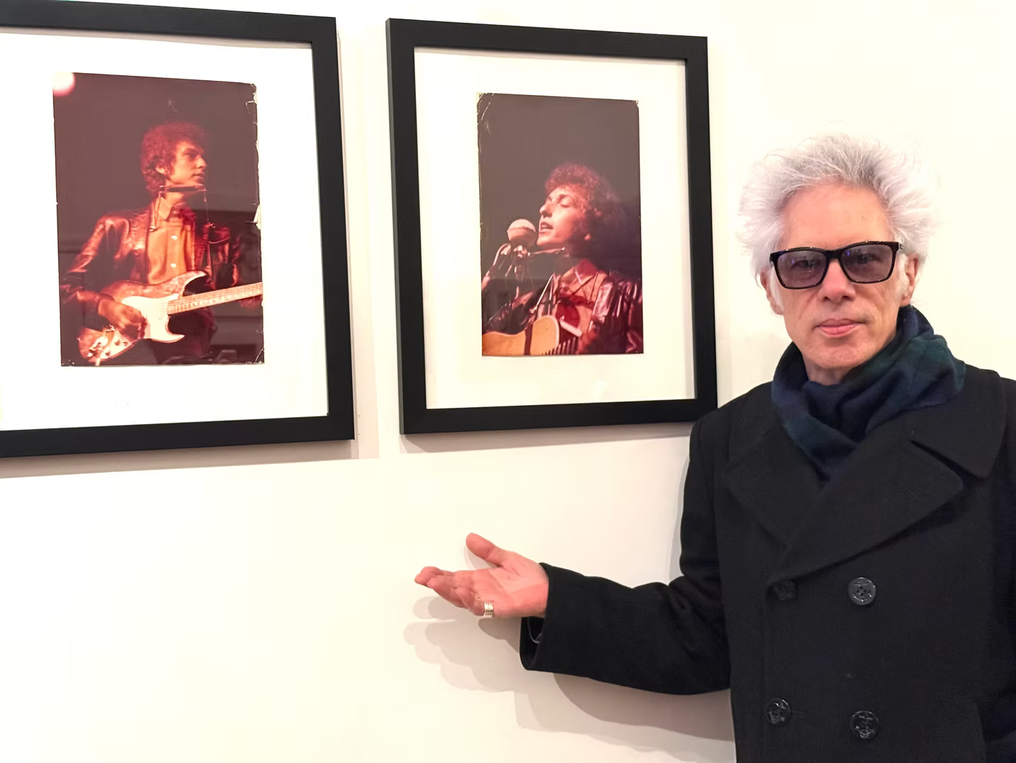 Filmmaker Jim Jarmusch viewing Bob Gruen's vintage Bob Dylan photographs at The Music Photo Gallery, SoHo, New York.