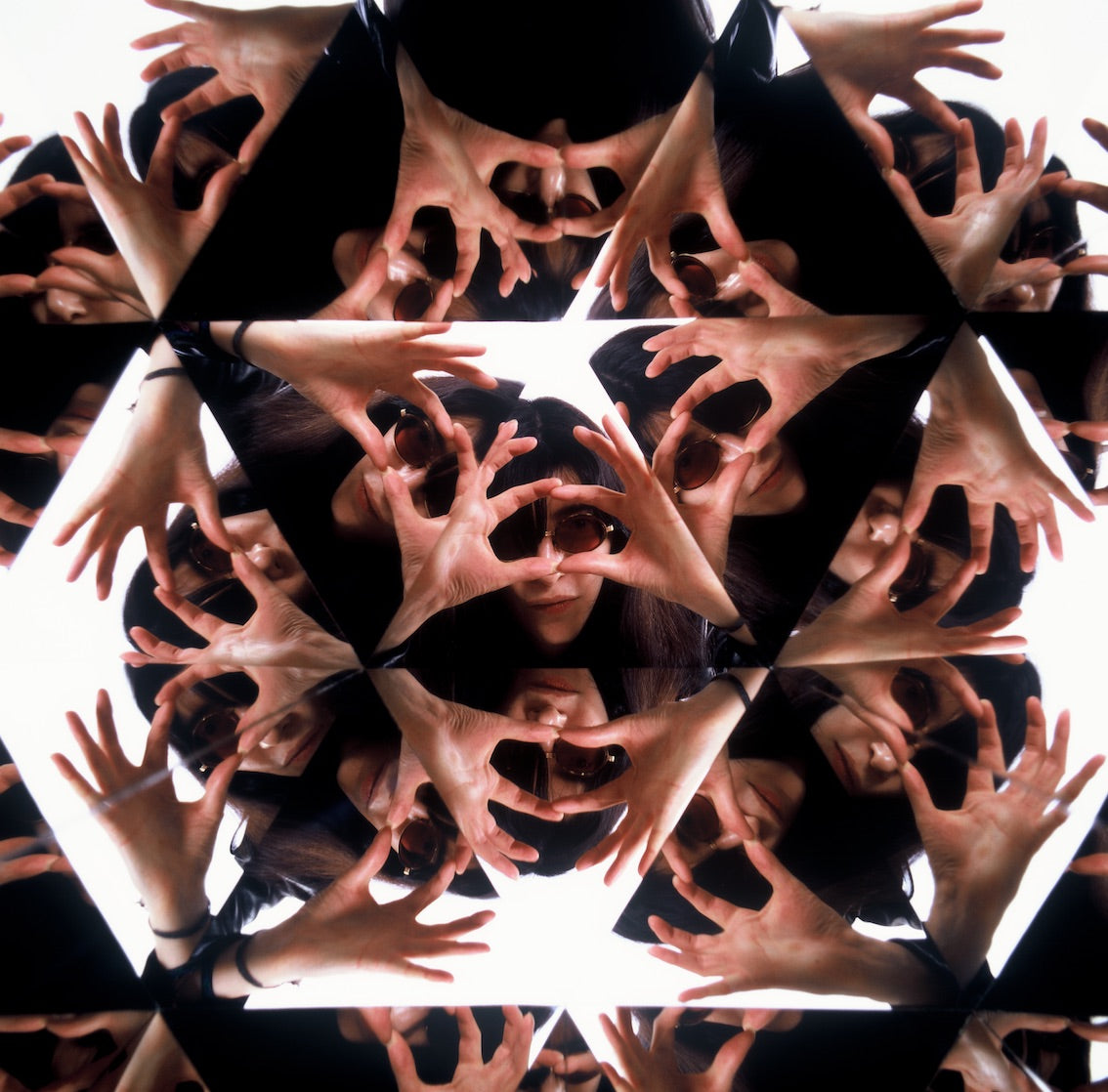 Joey Ramone, kaleidoscope mirror portrait, New York City, 1984, photographed by George DuBose.