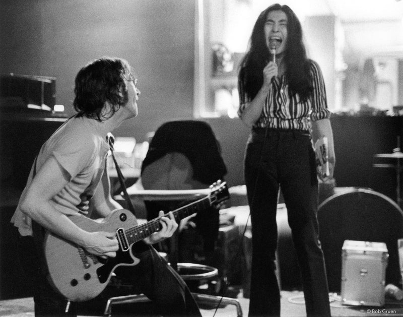 John Lennon playing guitar and Yoko Ono singing at Butterfly Studio in New York City, 1972, photographed by Bob Gruen.