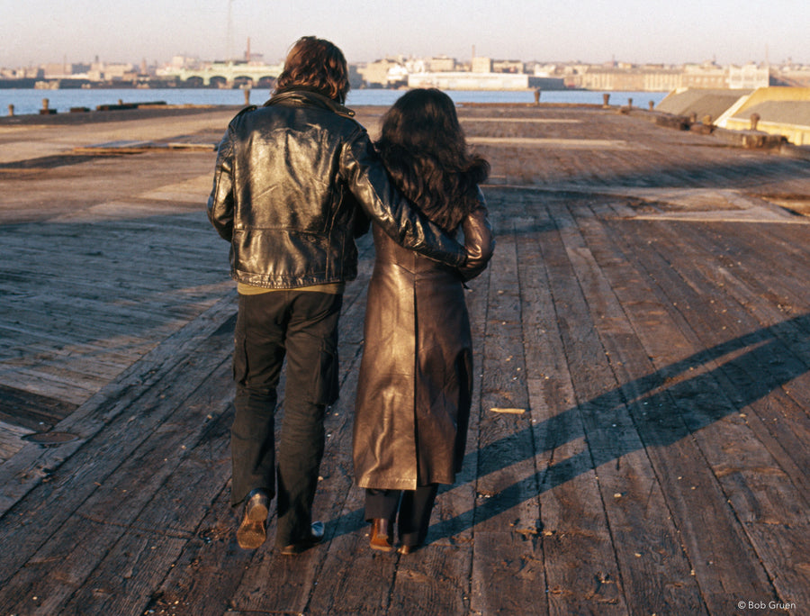 John Lennon and Yoko Ono walking together in New York City, 1972, photographed by Bob Gruen.