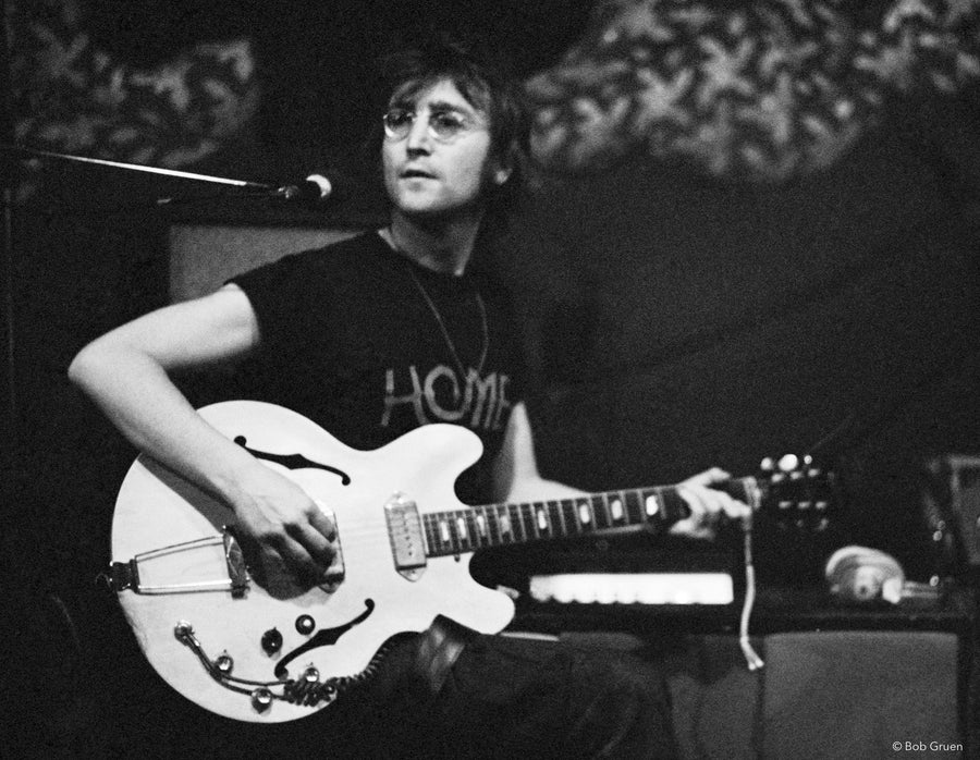 John Lennon playing guitar at Record Plant, New York City, 1972, photographed by Bob Gruen.