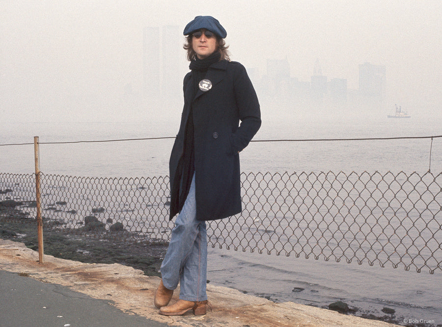 John Lennon at the waterfront in New York City, 1974, photographed by Bob Gruen.