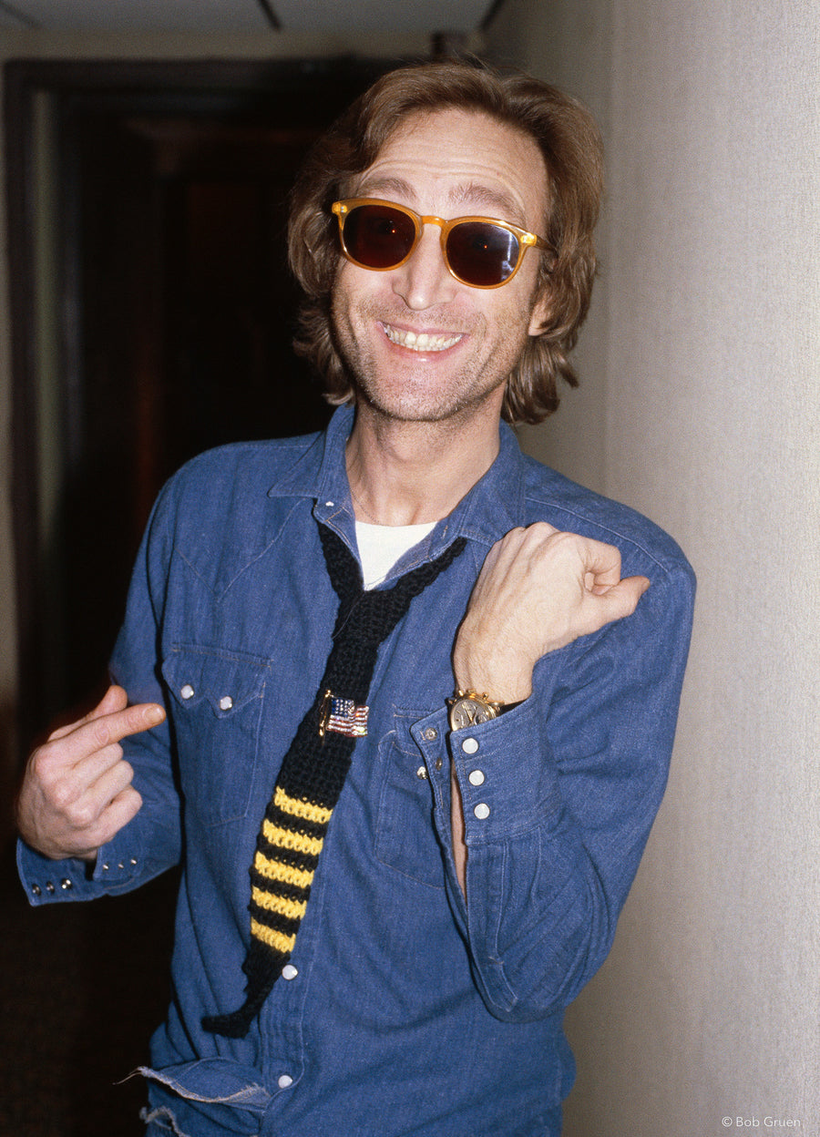 John Lennon wearing a striped tie at The Hit Factory, New York City, 1980, photographed by Bob Gruen.