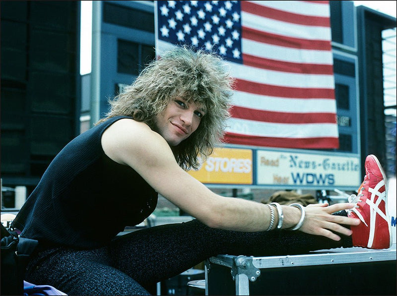 Jon Bon Jovi photographed at Farm Aid, Illinois, 1985, by Mark Weiss.