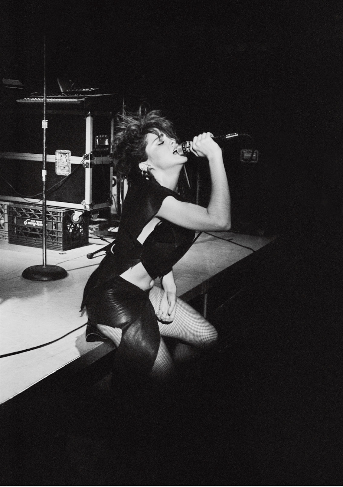 Madonna performing live onstage, photographed by George DuBose.