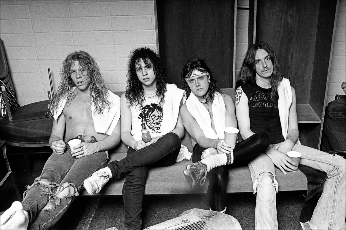 Metallica photographed backstage after a show during the Damage, Inc. Tour, 1986, by Mark Weiss.