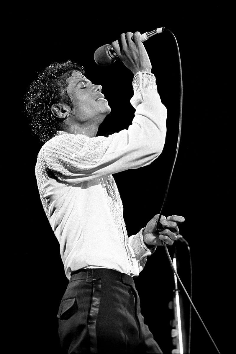 Michael Jackson Performing in Profile, New Jersey, 1984. Photograph by Ebet Roberts.