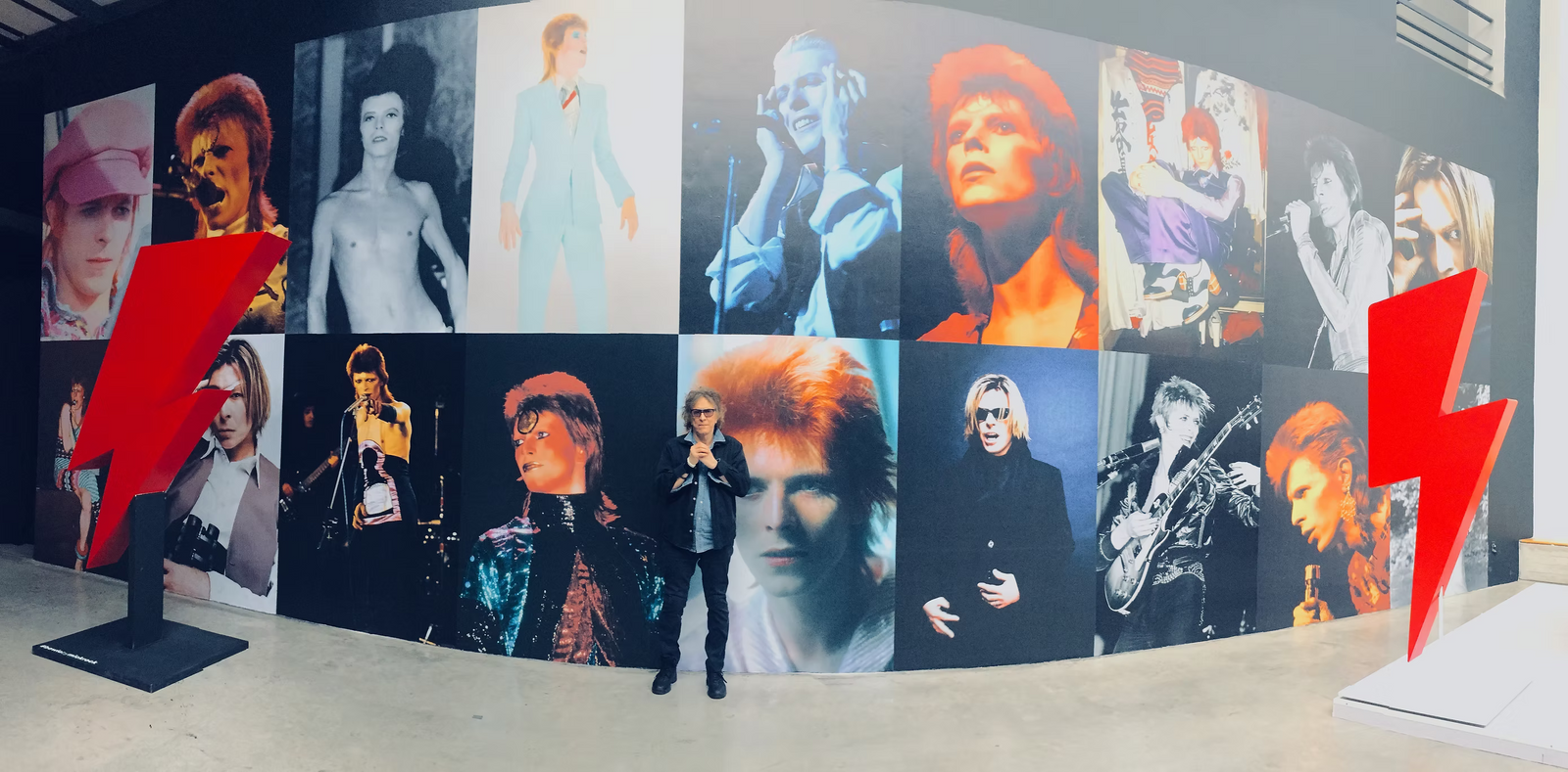 Mick Rock at the entrance to his David Bowie exhibition, Foto Museo Cuatro Caminos, Mexico City.