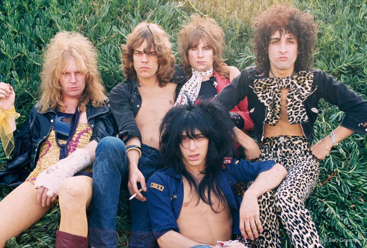New York Dolls in the Grass, Los Angeles, CA, 1973, photographed by Bob Gruen.