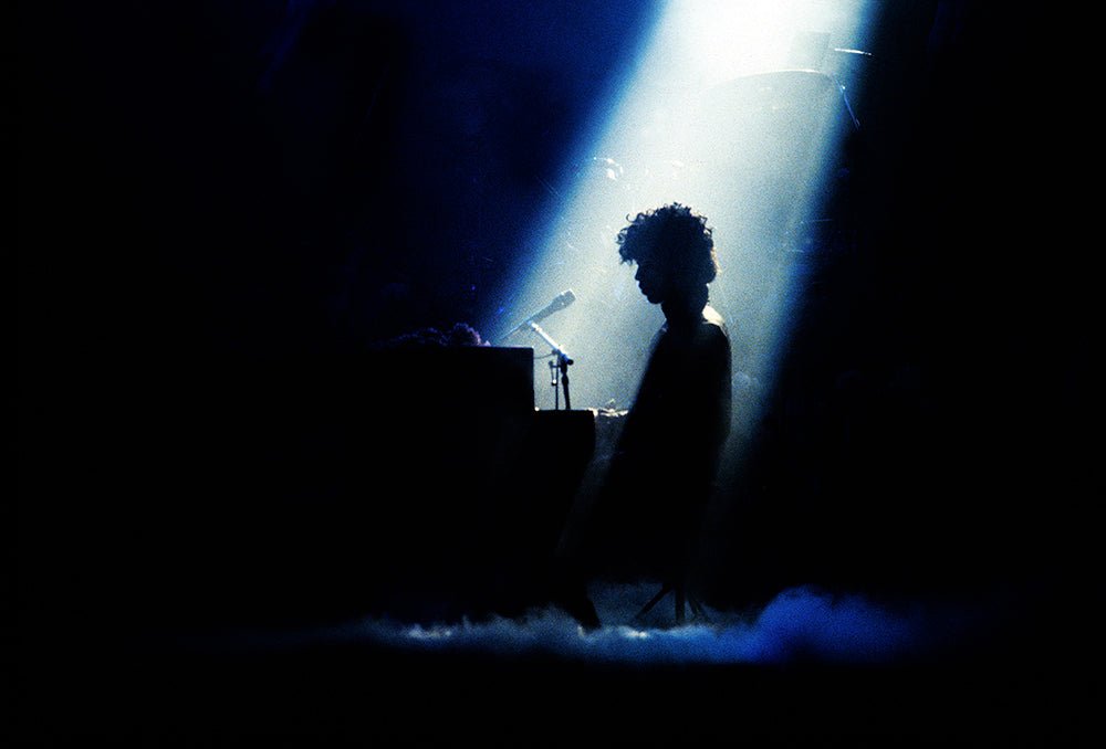Prince at Radio City Music Hall during the Purple Rain Tour, New York City, 1985, photographed by Mark Weiss.