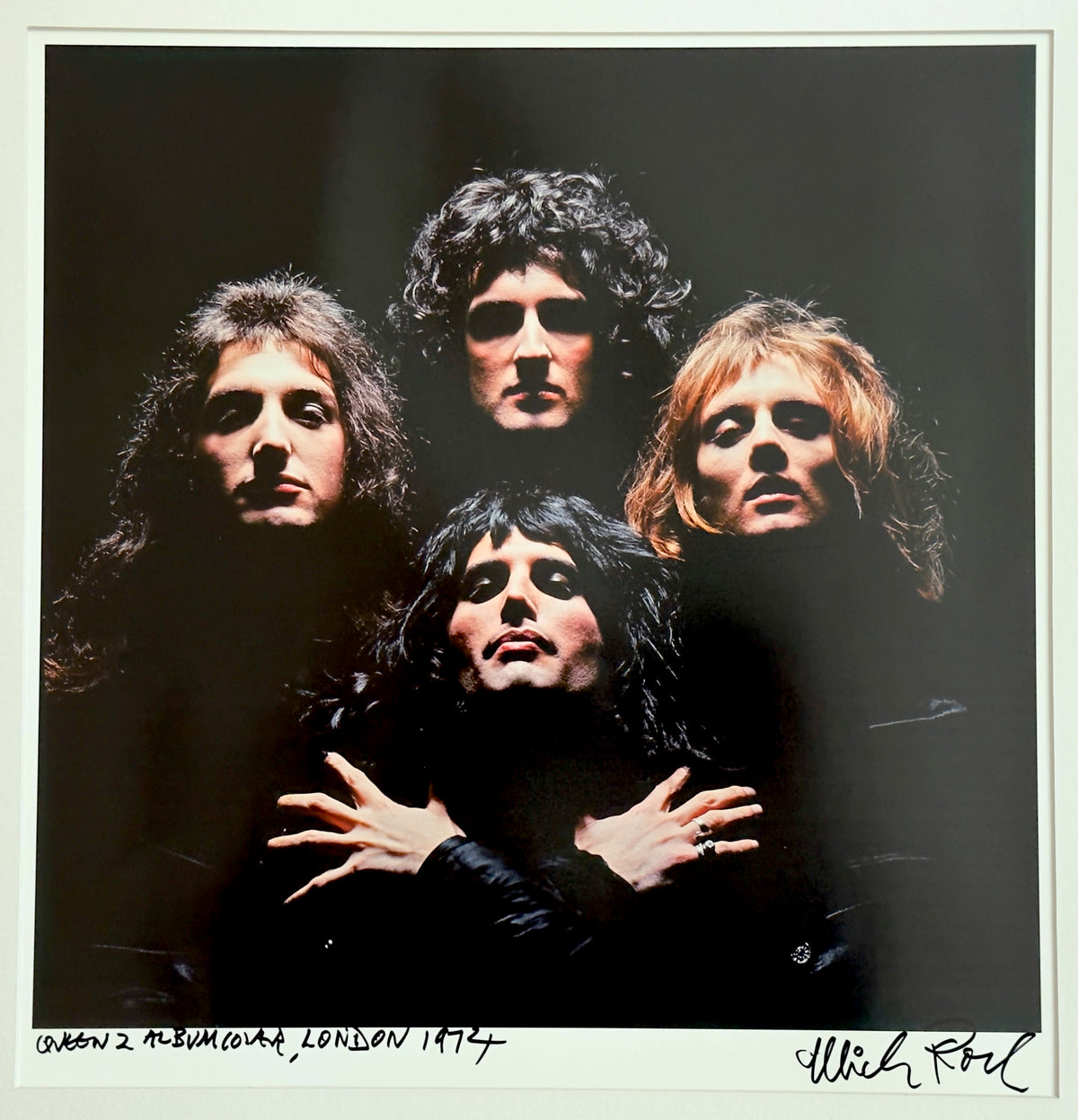 The Queen II album cover photograph — the band lit from above in the diamond formation later used for ‘Bohemian Rhapsody’, London 1974 — a signed, hand-titled late print by Mick Rock.