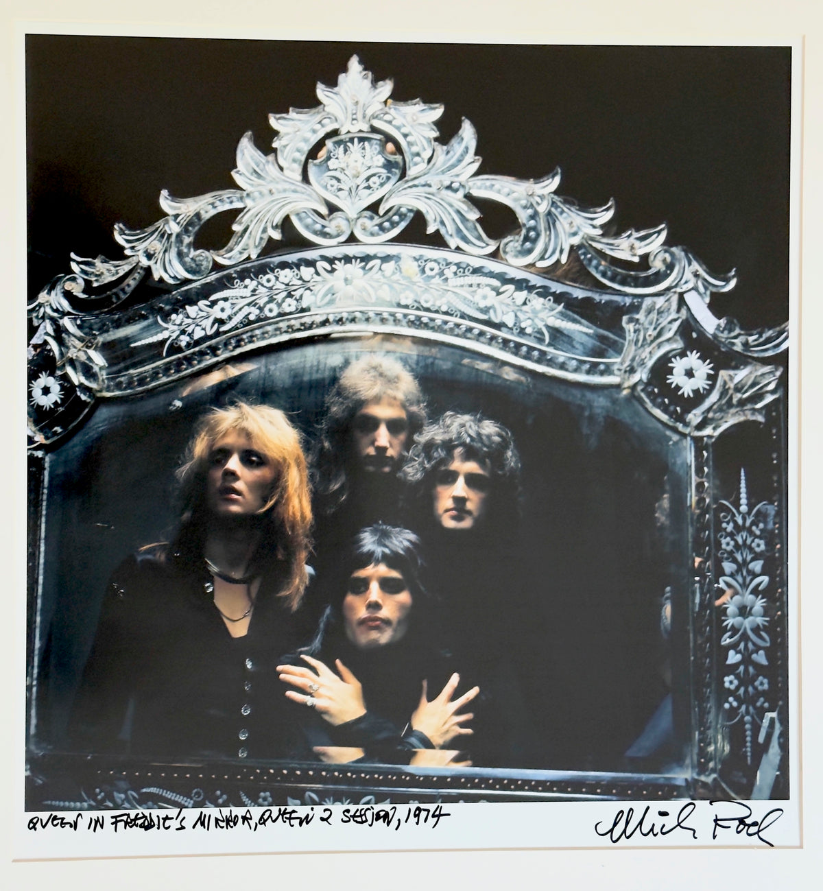 Queen framed within Freddie Mercury's ornate Venetian mirror during the Queen II session, 1974 — photograph by Mick Rock, a signed, hand-titled late print.