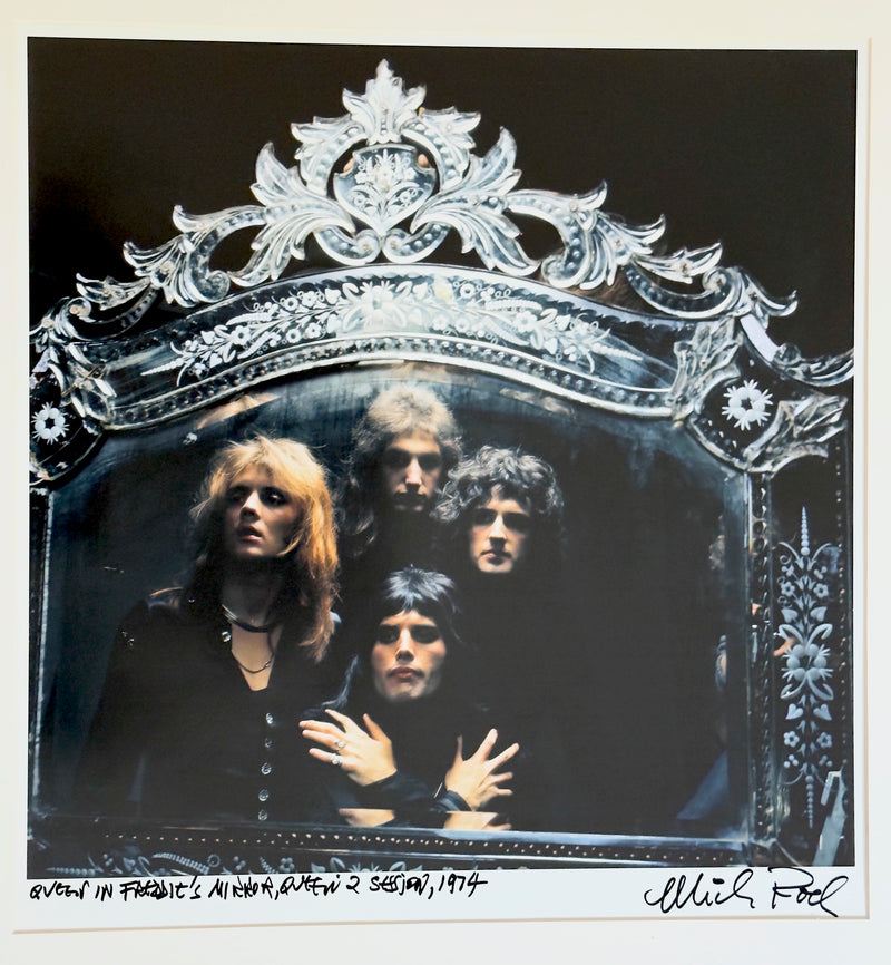 Queen framed within Freddie Mercury's ornate Venetian mirror during the Queen II session, 1974 — photograph by Mick Rock, a signed, hand-titled late print.