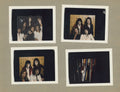Set of four color photographs of Queen in London by Mick Rock, mounted on cardboard. Unique vintage C-prints in Polaroid size.