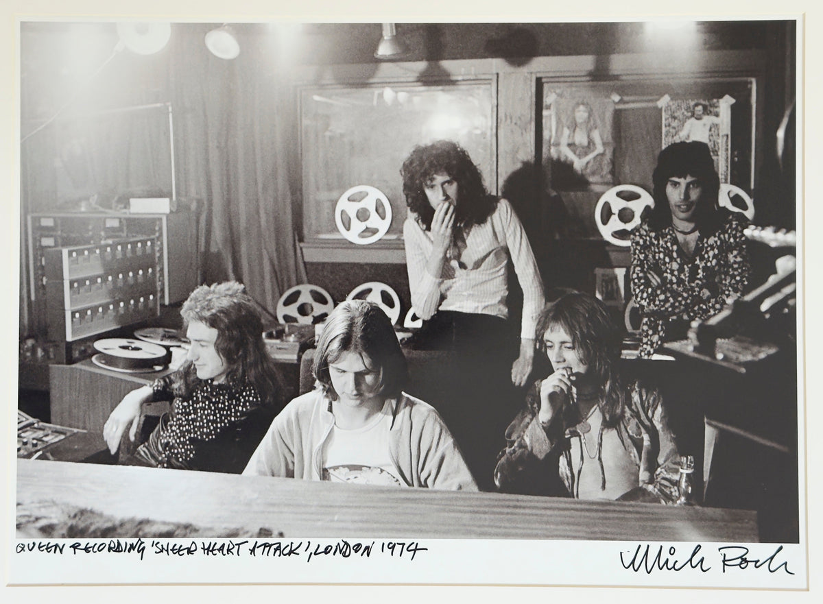 Queen recording Sheer Heart Attack in London, 1974, hand-titled and signed by Mick Rock.