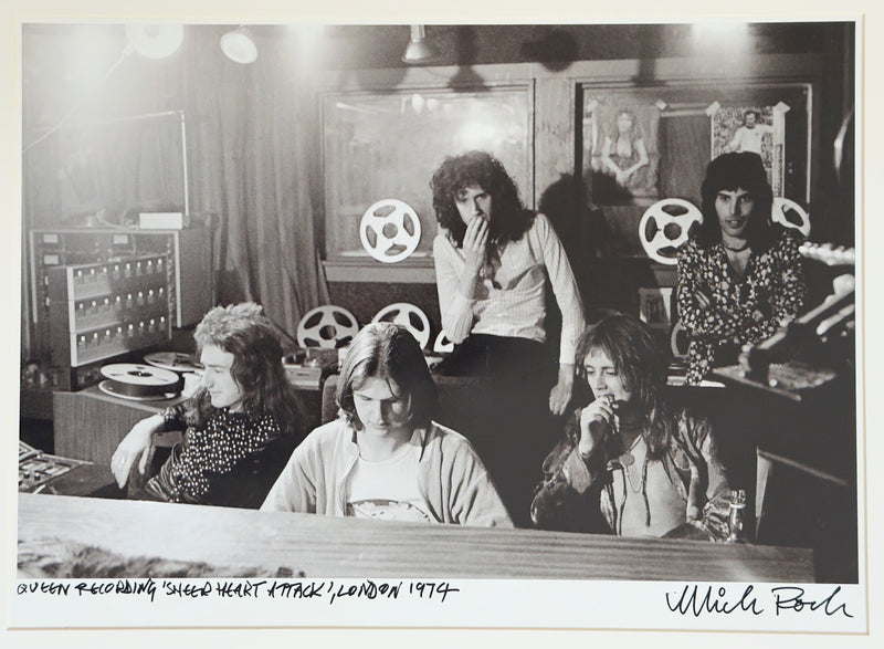 Queen recording Sheer Heart Attack in London, 1974, hand-titled and signed by Mick Rock.