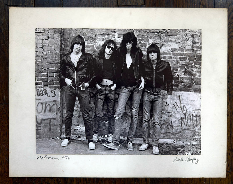 The Ramones in New York City, 1976, photographed by Roberta Bayley; original vintage gelatin silver print, signed and mounted with a white margin.