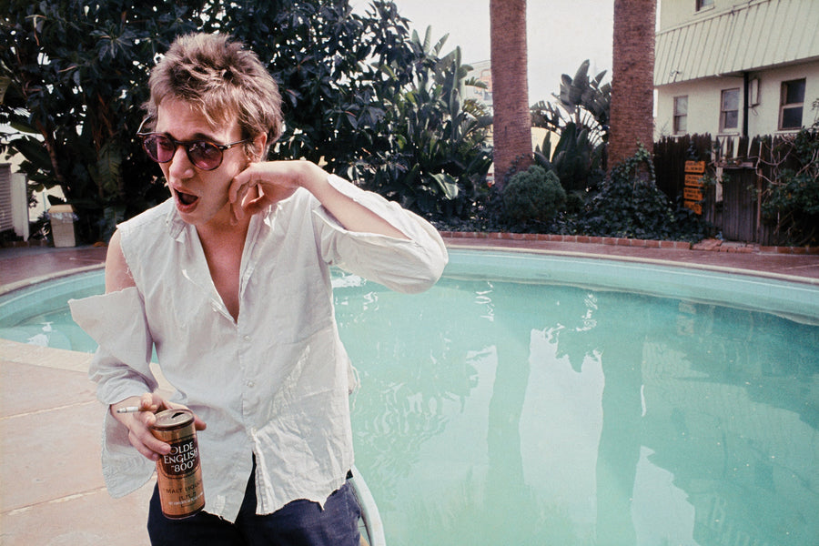 Richard Hell by a swimming pool, photographed by Chris Stein, 1978.