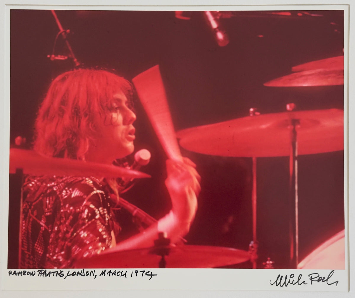 Roger Taylor performing at Rainbow Theatre, London, March 1974, hand-titled and signed by Mick Rock.