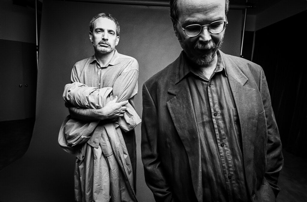 Donald Fagen and Walter Becker of Steely Dan, in black and white, 1995, photographed by Lynn Goldsmith.