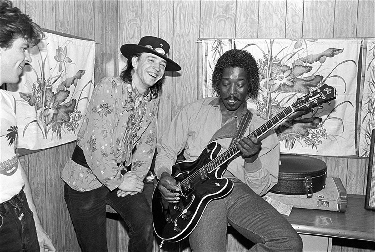Stevie Ray Vaughan and Buddy Guy, 1983. Photograph by Ebet Roberts.