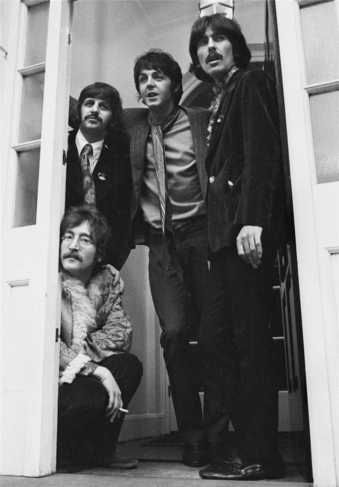 The Beatles at the Sgt. Pepper's launch party in Belgravia, London, 1967, photographed by Barrie Wentzell.
