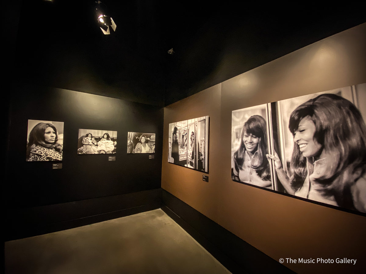 Gallery corner with black-and-white portraits of Tina Turner, including a large-scale print, in Tina Turner: A Journey to the Future at the Museum of Image and Sound (MIS), São Paulo, Brazil.
