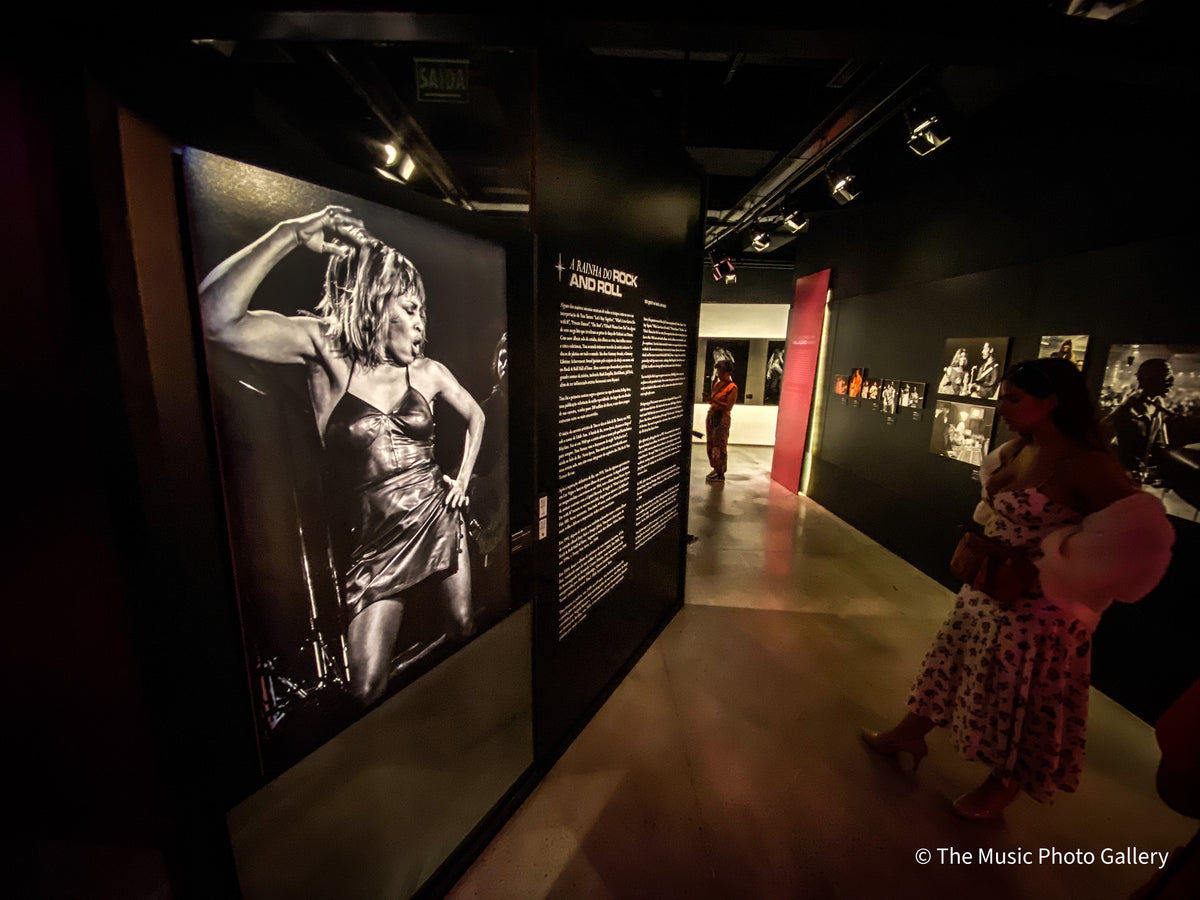 The Queen of Rock and Roll section, with a large black-and-white photograph of Tina Turner on stage, in Tina Turner: A Journey to the Future at the Museum of Image and Sound (MIS), São Paulo, Brazil.