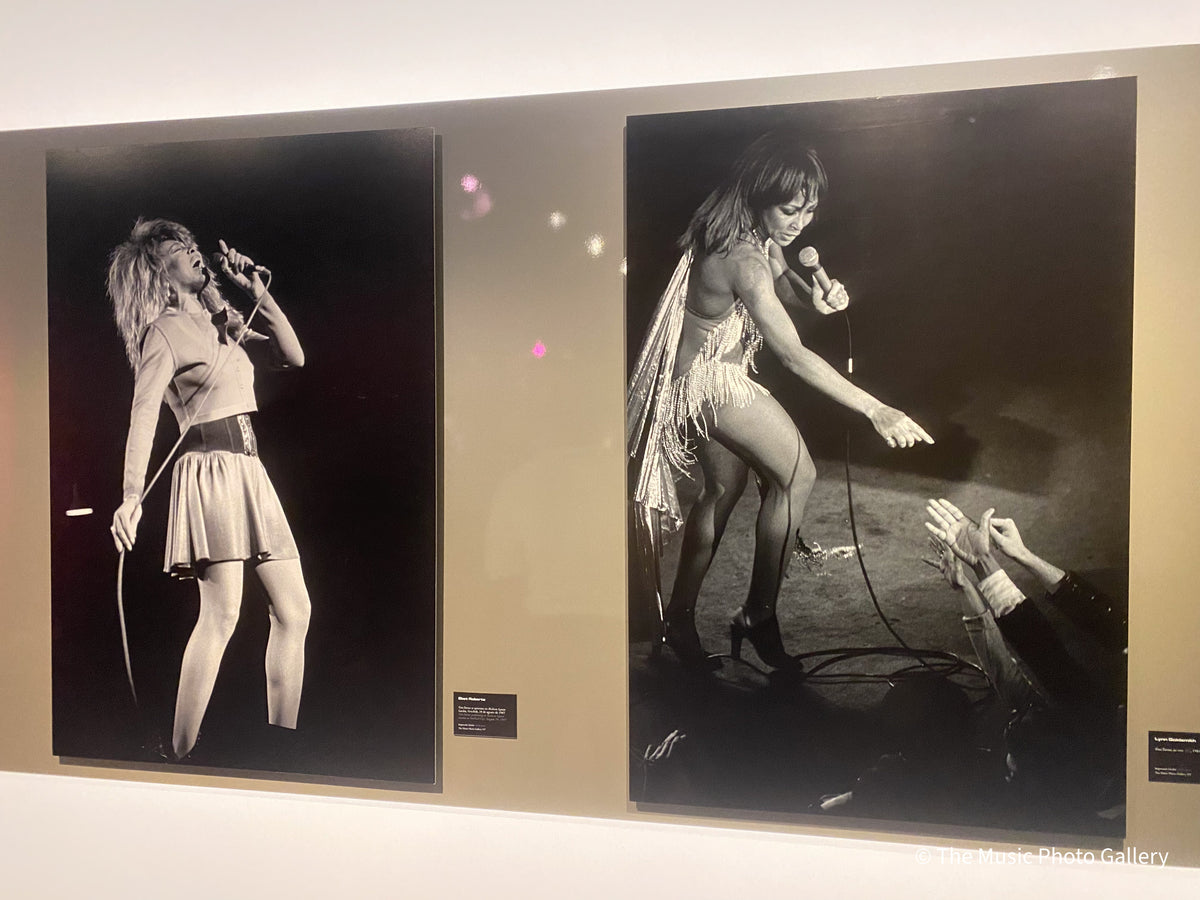 Two large black-and-white photographs of Tina Turner in performance in Tina Turner: A Journey to the Future at the Museum of Image and Sound (MIS), São Paulo, Brazil.