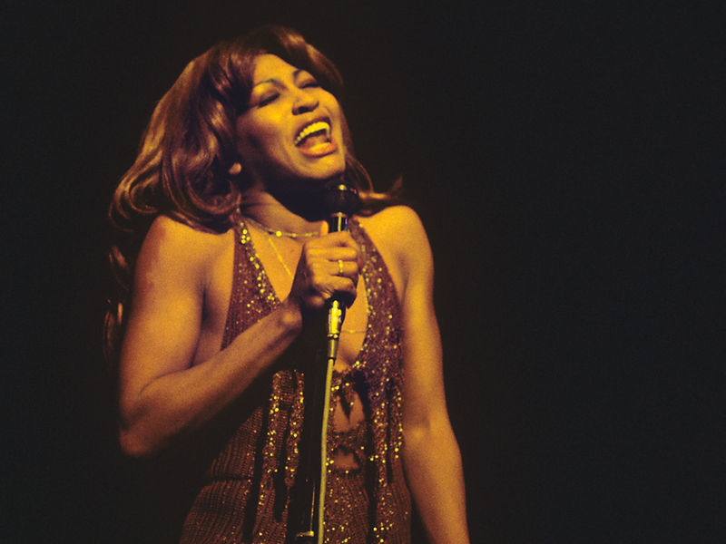 Tina Turner singing with her eyes closed during a performance in Rotterdam, 1975. Photograph by Gijsbert Hanekroot.