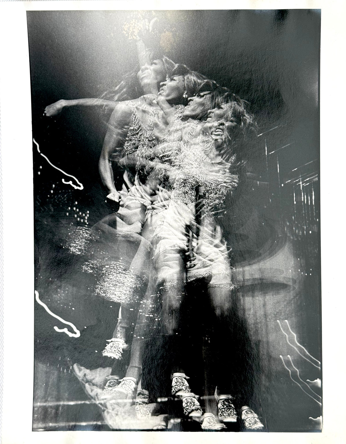Original vintage gelatin silver print of Tina Turner performing at the Honka Monka Club, New York City, 1970, a multiple-exposure image photographed by Bob Gruen.