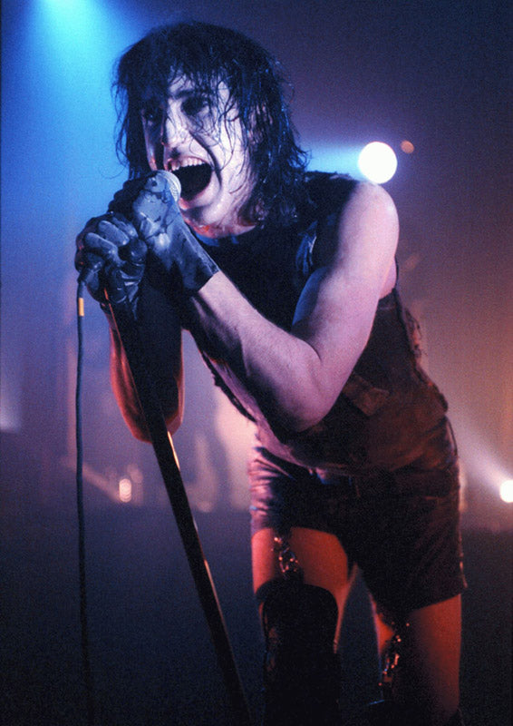 Trent Reznor performing live in London, UK, 1990, photographed by Ian Dickson.