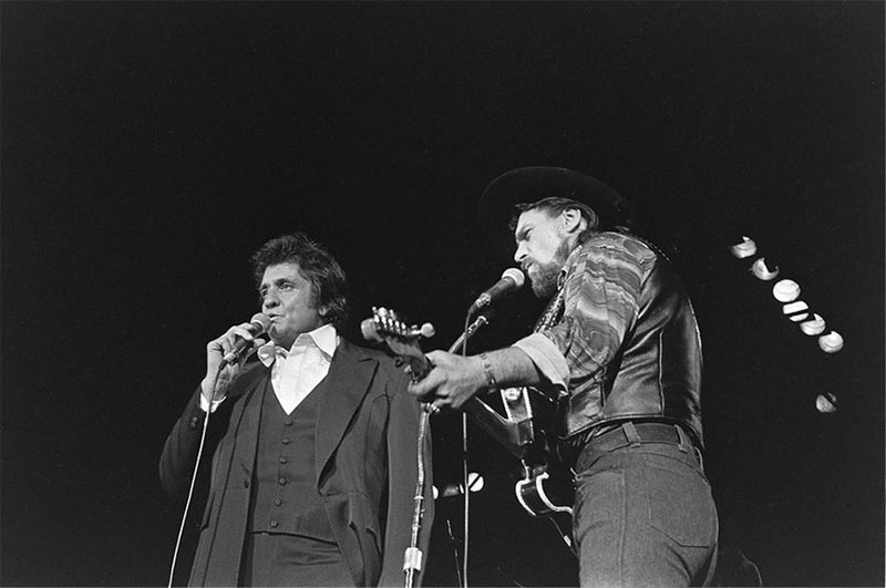 Waylon Jennings and Johnny Cash photographed together by Charlyn Zlotnik, 1978.